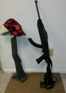 Same rifle, different hat. Of course the extra capacity magazine fits either configuration. The ten round standard magazine can be replaced instantaneously with larger or more of the same.