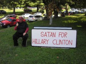 One dedicated fellow provided a jab at Hillary and her fans. "Satan" found some shade but the mask and dark clothing were still hot! 
