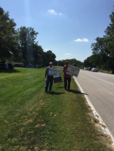 Two itinerant Hillary protestors